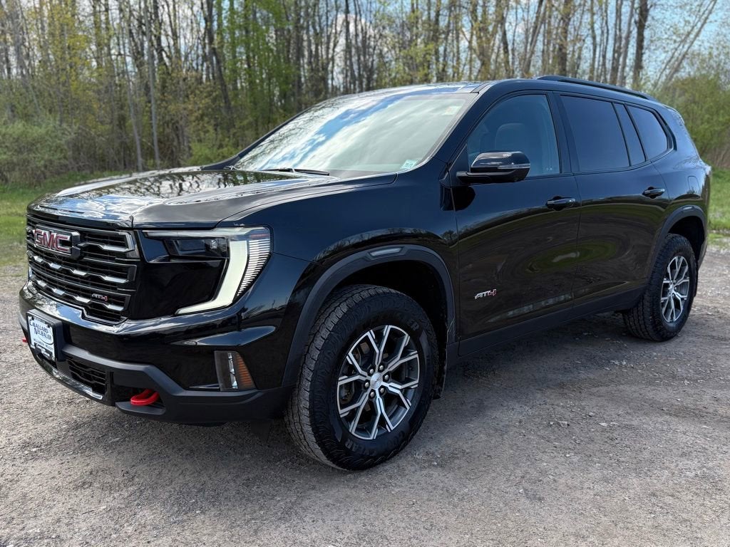 2024 GMC Acadia AT4 in Ebony Twilight Metallic — front three-quarter view